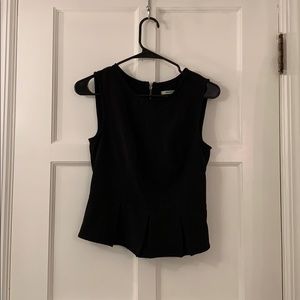 Black sleeveless peplum top